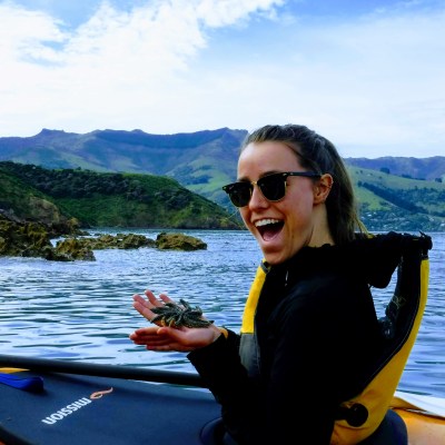 girl holding a starfish