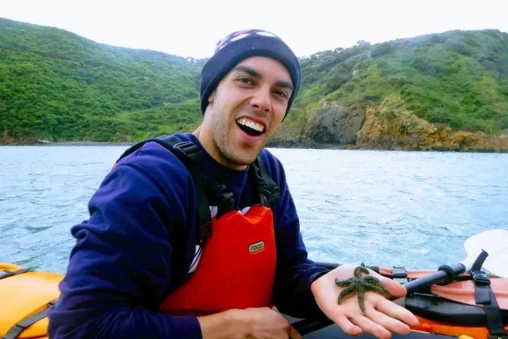guy holding a starfish