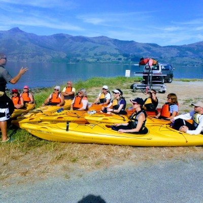 people in yellow kayaks